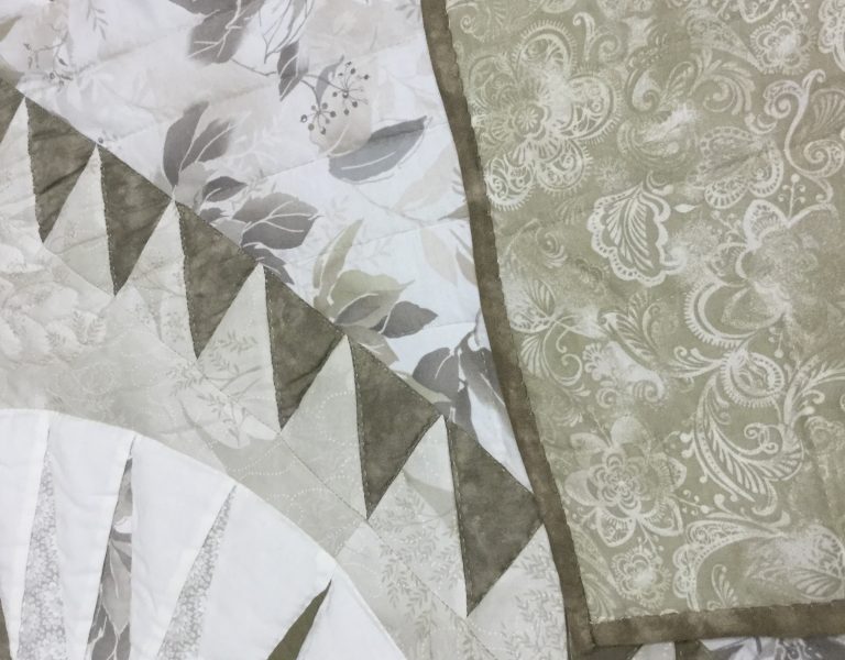 beautiful front and back of mariner's compass quilt