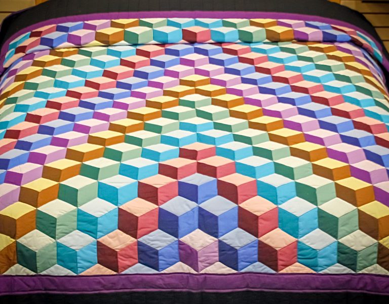playful tumbling blocks quilt pattern by amish in lancaster county 2 1